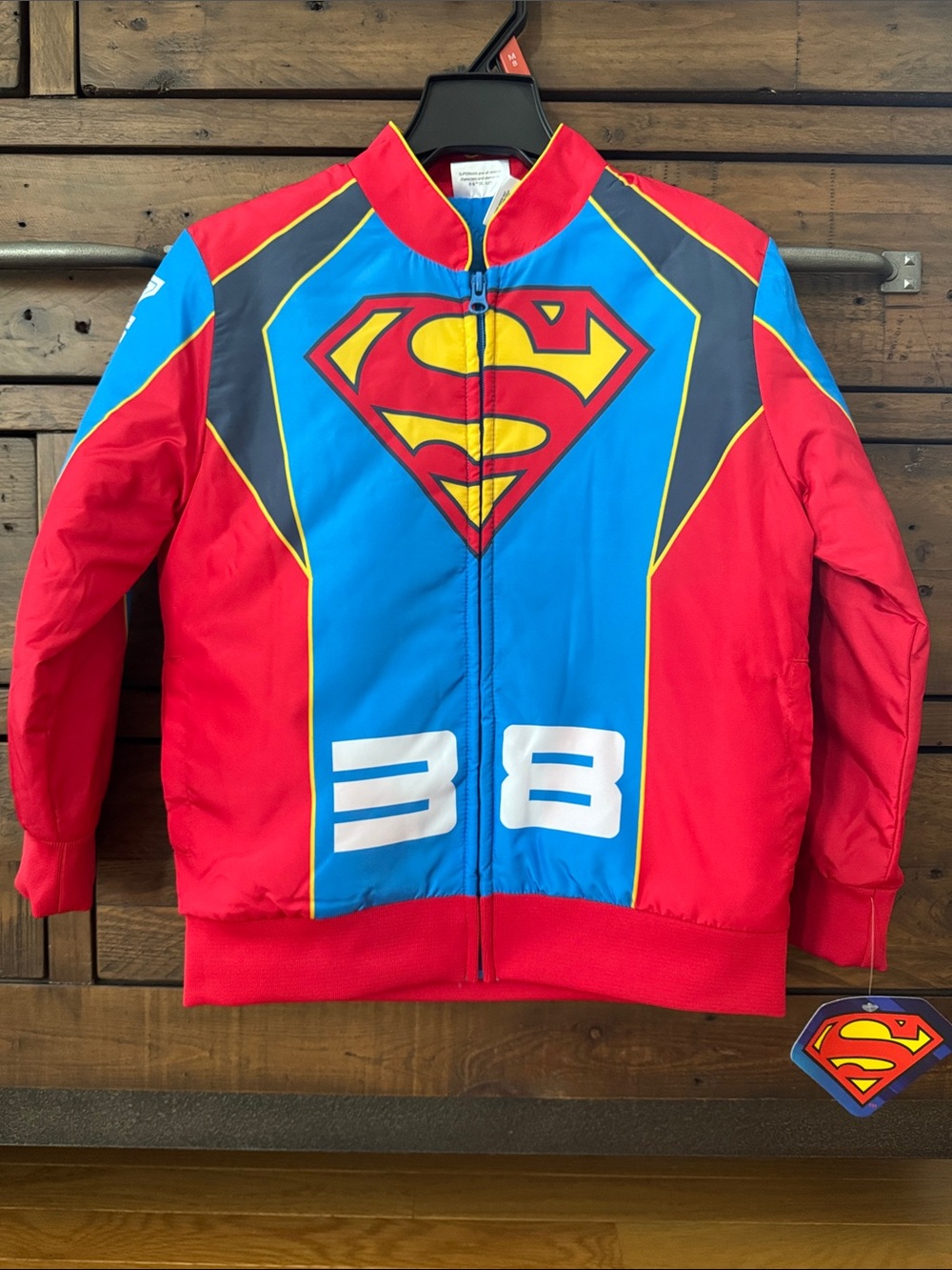 NWT Superman boys' graphic bomber jacket featuring a large logo and "38" graphic